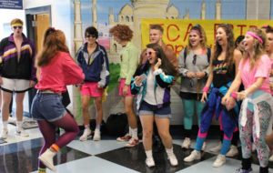 Students from the class of 2017 participate in a dance off near the attendance office.  To help this year’s students prepare for Decades Day, The Prowler has compiled a playlist of the hottest music from each decade celebrated during Homecoming week.