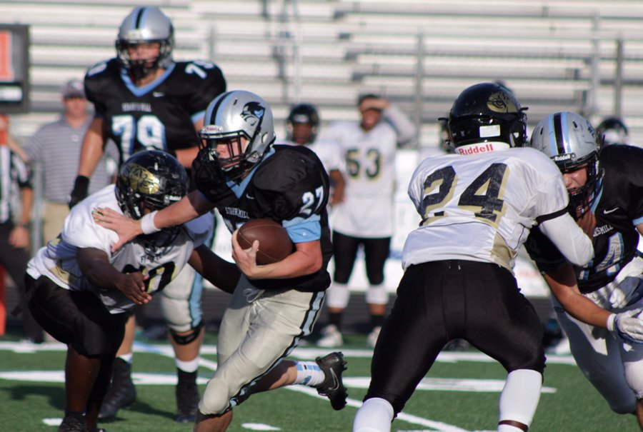 Freshman running back Nate Kearns runs the ball against Fayette County. The run game was very important to the Panther offense, as all five of their touchdowns came on the ground. 