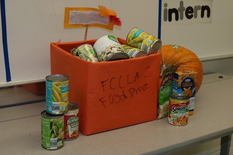 This orange box, located at the front of Hope Via’s room, holds some of the food donated by students. The food will be collected through Nov. 3 and then delivered to the Fayette Samaritans.