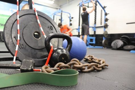 Students use the weight room at Starr’s Mill during their weight training class. For those who take the class, this is a great time to get a workout in during school hours with many equipment options and guidance from peers. 