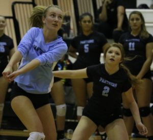A Lady Panther sets up to hit a ball. The Mill lost to McIntosh 3-0 in the final four of the AAAAA GHSA state playoffs.