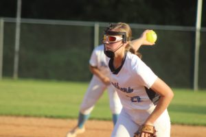 Sophomore Paige Andrews sends a ball to the plate. Andrews was awarded with Pitcher of the Year from the Fayette Daily News of the 2017 year.