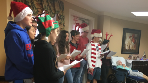 Interact Club members sing “Jingle Bells” to the seniors citizens living at Southland Health & Rehab Center. Interact Club is a leadership club that provides services by bringing the volunteers and community together.