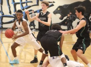 One of the top scoring sophomore players dribbles the ball down the court. Starr’s Mill was able to score most of their points in the beginning of the second half, but could not handle the full court pressure from the Chiefs.