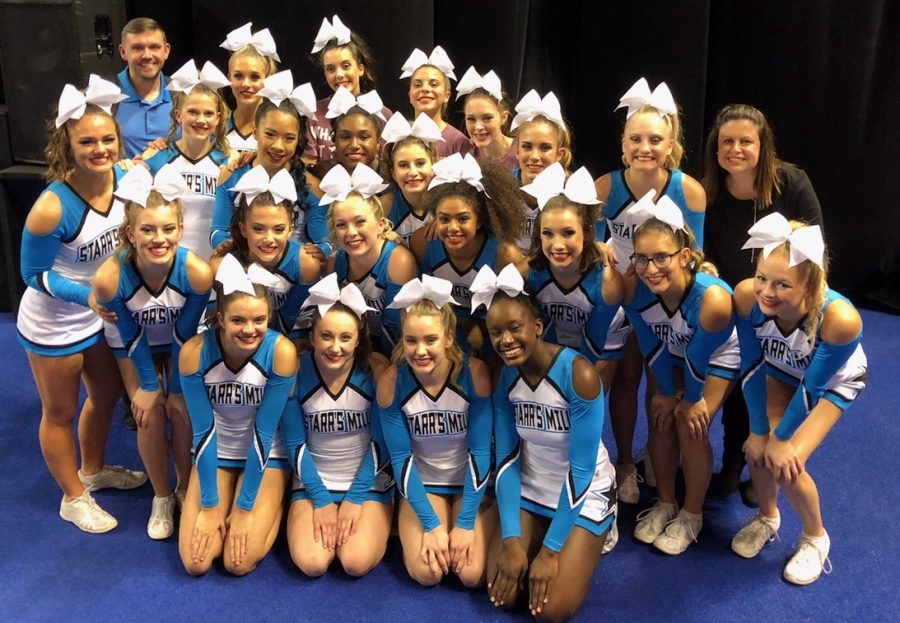 The varsity cheer squad poses after its performance. The Starr’s Mill varsity cheerleaders placed 3rd overall in the state tournament and came close to topping cross-town rival McIntosh.