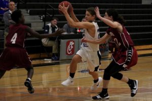 A sophomore guard drives the ball to the hole. The Panthers were able to get to the free throw line often by driving to the basket, but failed to convert on several attempts.