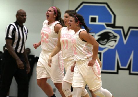 Three players celebrate after the big win. The Lady Panthers have now swept the Chiefs in the regular season and occupy the top spot in region 3-AAAAA.