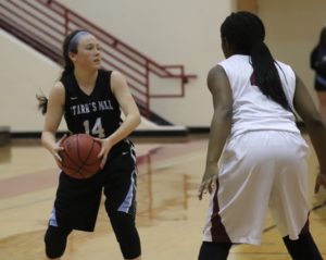 A Lady Panther player in triple threat position. Starr’s Mill caught fire from behind the arc, sinking seven of 14 on the game, and the Lady Wildcats were unable to keep up. 