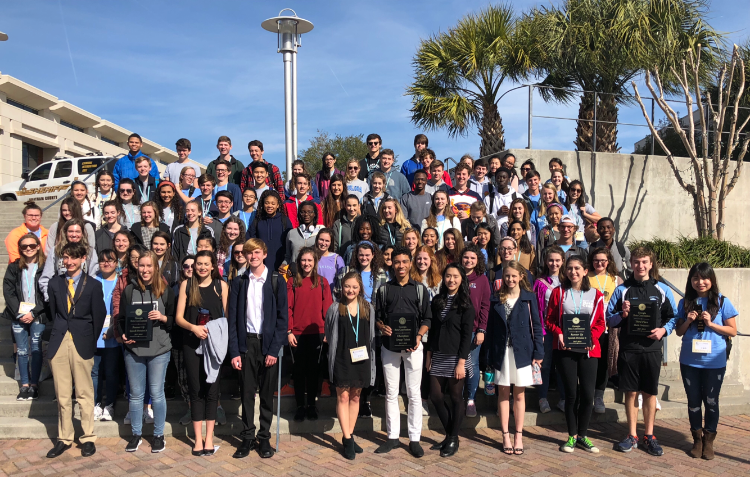 Starr’s Mill Beta Club students pose for a group photo on the steps outside the convention center in Savannah, Ga..  Members of the club traveled down to Savannah for the annual Beta Convention on Jan. 24-26.