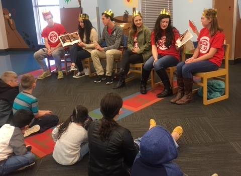 Spanish Honor Society students read bilingual books to children ages four through eight. Bilingual Storytime is an activity started by Spanish teacher Madeline Rodriguez that strives to expose young children to a new language and create a positive environment through learning.