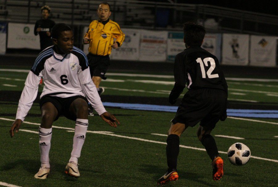 A Panther defends the ball from a Carrollton player. The Panthers started strong on defense, but surrendered a 2-0 lead in the second half, resulting in a 3-2 loss.