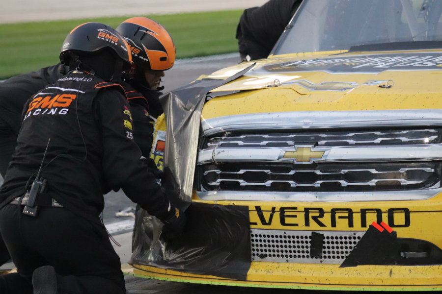 Crew members work to repair Dalton Sargeant’s truck after a late-race wreck with the No. 33 truck driven by Josh Reaume.  On the ensuing pit stop, Busch left the pits before the lugnuts on his left rear were completely secured. His tire fell off before he returned to the track, forcing him to pit again and resulting in a 21st place finish. 
