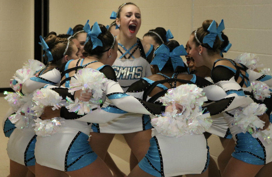 Feb. 10, 2018 - A sophomore leads the rest of the Pantherettes in their pre-performance chant before their pom routine at the Peachtree City Dance Competition. The Pantherettes placed first in the small varsity jazz division and runner up in the small varsity pom division at the competition. 