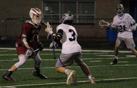 Senior Ethan Sack tries to fake out a defender en route to the goal. Sack went off during the game, scoring five of the Panthers’ 16 goals.