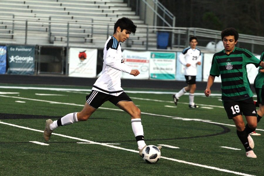Starr’s Mill JV soccer player looks to play the ball during the team’s last meeting with McIntosh of this JV season. The JV boys lost 5-0 to their local rivals.