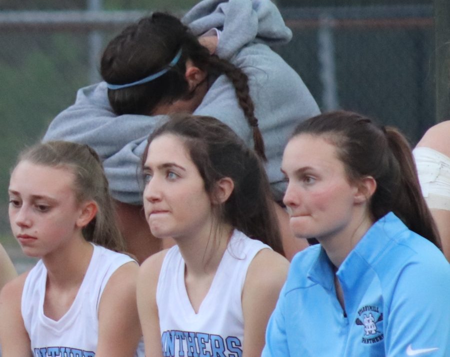 The Lady Panthers discuss their loss with the coaches after the game. Their 10-9 loss to West Forsyth was the team’s first loss of the season. 