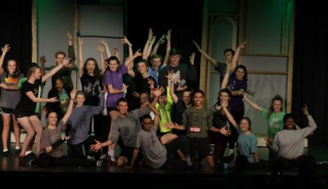 The cast from “The Wizard of Oz” poses on stage, ending their rehearsal for the day. Tickets are on sale in the front office: $10 for students and $12 for adults.