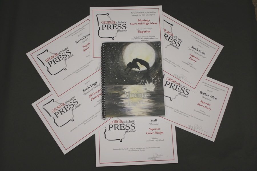 Volume+XIII+of+MUSINGS+earned+six+separate+awards+from+the+Georgia+Scholastic+PRess+Association.+The+cover+of+the+magazine+was+diligently+picked+to+be+eye-catching%2C+interesting%2C+and+showcase+a+magazine+others+would+want+to+read.