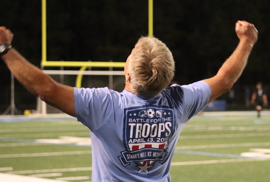 Head coach Mike Hanie celebrates the win over McIntosh. After going 1-4 in the last five matches, the Panthers defeated the Chiefs 3-0, securing the No. 1 seed in Region 3-AAAAA.
