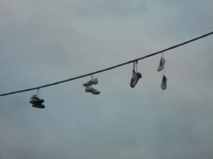 Shoes tied up and slung across wires such as the picture shown above are a common sign that drug dealers are selling products nearby. However serious this problem is, putting the death penalty on the table will not do anything to help end this huge nationwide dilemma. 