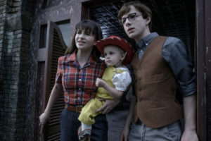 The Baudelaire children— Violet, Klaus, and Sunny— in the episode “The Vile Village.” Despite some questionable decisions by the writers, the series is best when it focuses on what viewers care most about: the dire straits of the Baudelaires and capturing the tone of the beloved books.