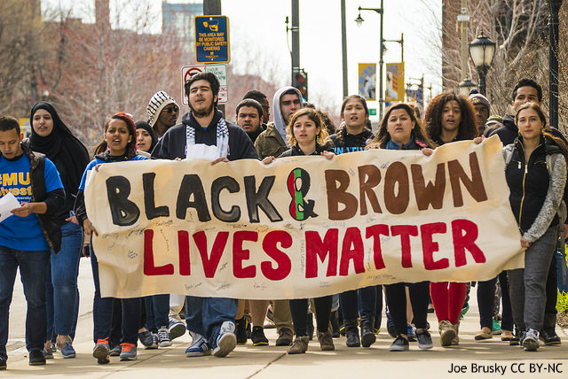 Students+at+a+protest+fighting+for+black+and+brown+lives.+Partaking+in+ideals+such+as+arming+teachers+will+only+increase+the+oppression+they+face.+