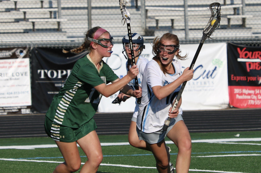 Senior Caroline Broderick fends off a Wesleyan defender. The Lady Panthers advanced to the Final Four of the state tournament where they’ll play Westminster. The Wildcats eliminated Starr’s Mill in the Final Four two years ago, but the Lady Panthers are seeking revenge.