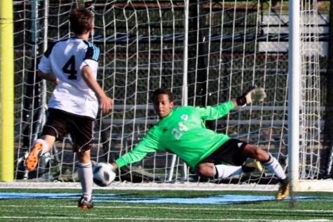 Starr’s Mill’s keeper blocks one of many attempted goals by the Thomas County Central Yellow Jackets during the second round of AAAAA GHSA state playoffs. “[Going into Saturday], we definitely need to talk more and call for the ball if one person is going to go for it, so we don’t collide and both go for the ball at the same time,” freshman Andrew Cole said. 