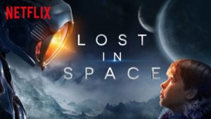 Space explorer and the youngest Robinson, Will, stares at an alien robot whom he befriends by saving his life. The robot is one of many changes made for Netflix’s new reboot of ‘Lost in Space’ that might not be for the better.
