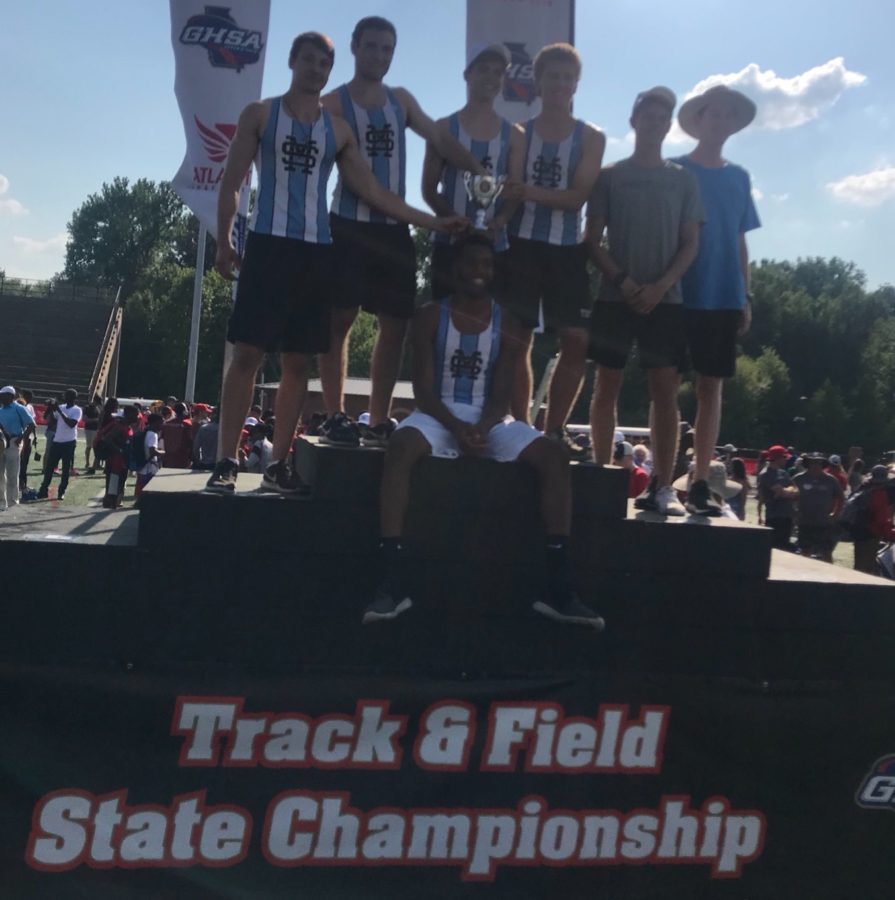 Starr%E2%80%99s+Mill+High+School+boys%E2%80%99+track+and+field+team+poses+with+their+runner-up+trophy+in+the+AAAAA+GHSA+state+championship.+The+boys+team+made+up+for+their+fourth+place+finish+last+year+with+the+second+place+finish+this+year.+Top+performers+included+two+first+place+finishes+by+junior+Harrison+Fultz%2C+a+first+place+finish+by+junior+Nick+Nyman%2C+and+a+third+place+finish+by+senior+Brandon+Rew.