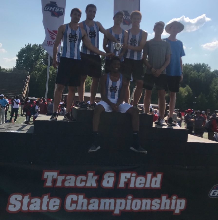 Starr’s Mill High School boys’ track and field team poses with their runner-up trophy in the AAAAA GHSA state championship. The boys team made up for their fourth place finish last year with the second place finish this year. Top performers included two first place finishes by junior Harrison Fultz, a first place finish by junior Nick Nyman, and a third place finish by senior Brandon Rew.
