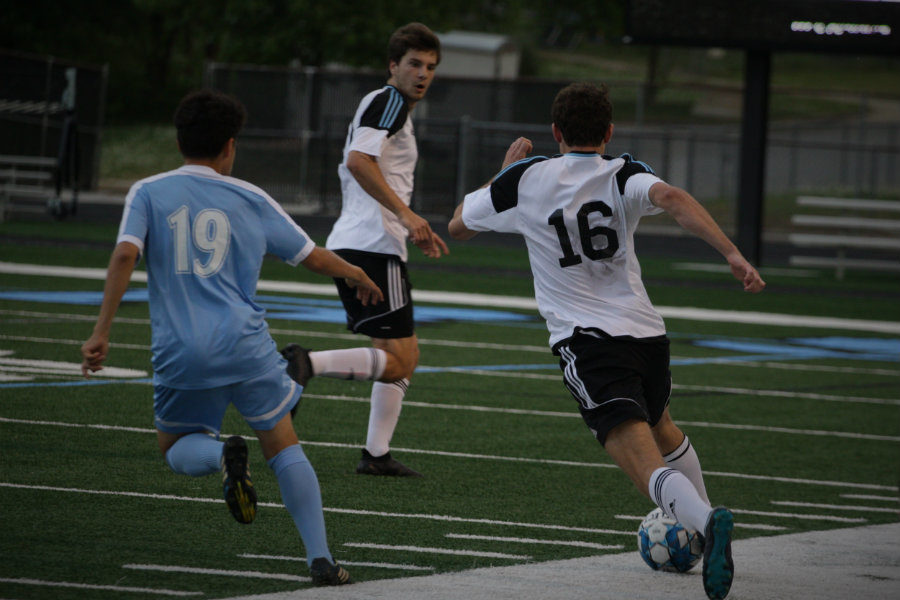 Starr’s Mill player prepares to pass the ball to another Panther, preventing a Knight from intersecting the ball. The Panthers lost the final four game against the Johnson Knights 4-1, ending their season.