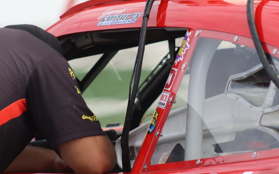 NASCAR Xfinity driver and former Peachtree City resident Garrett Smithley discusses with his crew chief before the Rinnai 250 race at Atlanta Motor Speedway earlier this season. Smithley has gotten a lot of attention after a pair of top-ten finishes at restrictor plate race tracks, including a tenth place finish at Talladega Superspeedway this past weekend.