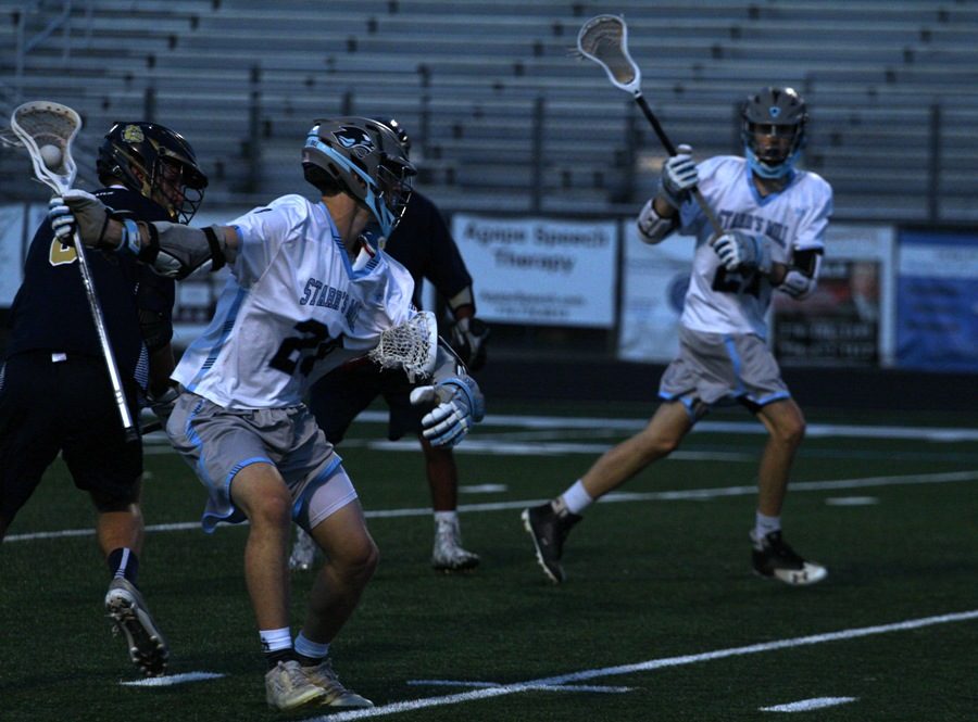 Panther looks to pass the ball to a nearby teammate. Good team play and great defense allowed the Panthers to decimate Decatur 18-0 in the first round of the GHSA state playoffs.