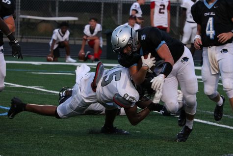 Senior Cavalier linebacker Qua Hines brings down junior Panther running back Ardit Hoti. Callaway bested Starr’s Mill in Friday night’s scrimmage 26-6, but the Panthers are still ready for another region championship run. “We didnt really gameplan for [Callaway],” junior quarterback Hunter Lawson said. “It didn’t end in our favor but we got better from it.”