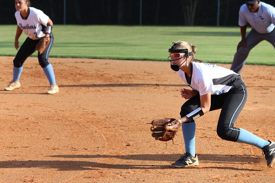 Junior+Paige+Andrews+in+ready+position+at+first+base.+Senior+Wakana+Sato+struck+out+six+of+the+nine+batters+she+faced%2C+leaving+the+Lady+Panther+defense+with+little+to+do.