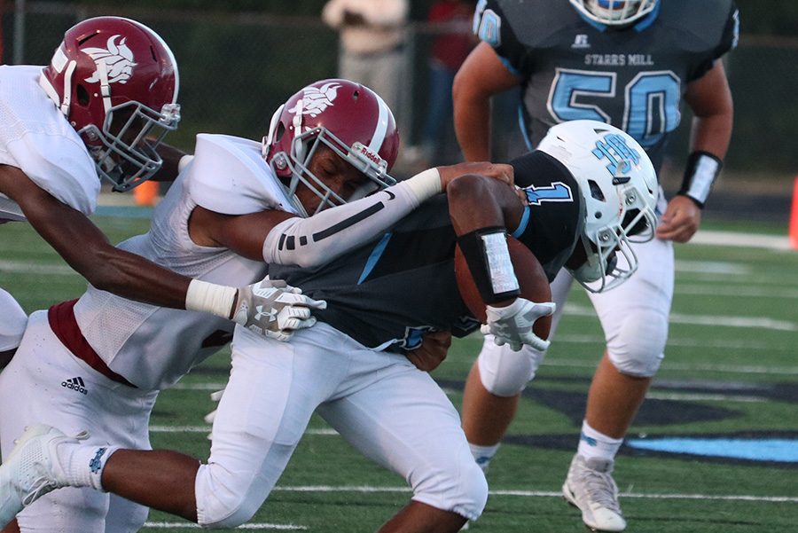 Northgate defender drags down junior running back Kalen Sims. Sims rushed for 148 yards and three touchdowns against the Vikings, but it wasn’t enough as the Panthers fell 31-29. 