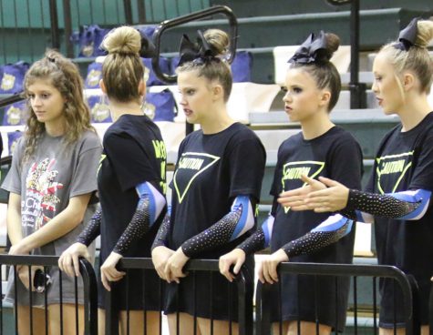 Starr’s Mill varsity cheerleaders await their turn to perform. Both the varsity and JV Lady Panthers finished second overall at McIntosh on Saturday. Varsity placed behind last year’s state champs Carrollton.