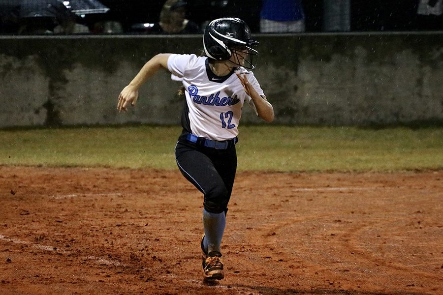 Sophomore Lauren Flanders runs to first base. The Lady Panthers consistently got on base during both games. Starr’s Mill was also able to steal bases, allowing them to have runners in scoring position.