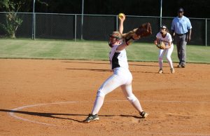 Freshman Sarah Latham pitches to an opposing Wildcat. Latham pitched an outstanding game against Whitewater, only allowing four hits in the 6-0 win. On offense, Latham added a run off an infield error.