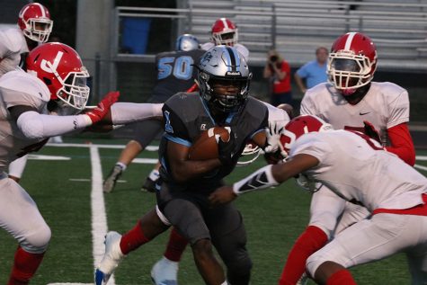 Junior running back Kalen Sims weaves through the Jonesboro defense. Sims contributed to an offense that put up 462 yards against the Cardinals. The junior was responsible for 97 of the team’s 411 rushing yards.