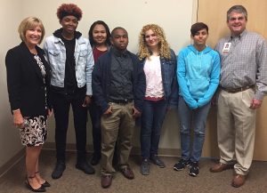 The participants in this years Project SEARCH program all stand with Piedmont CEO Michael Burnett. This years interns learned skills to help them in their future endeavors while also benefiting the hospital by helping with day to day tasks.