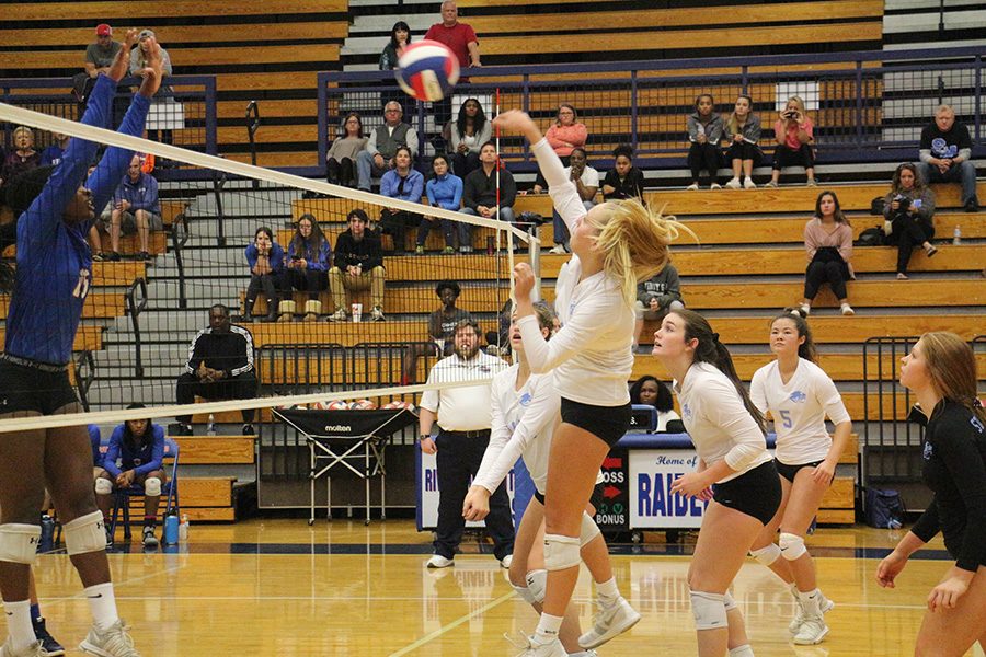 Senior Lilli Ryan spikes the ball. The team played amazingly in the big comeback victory over Riverwood, allowing the team to advance to the final four where they will face Whitewater in a region tournament rematch.