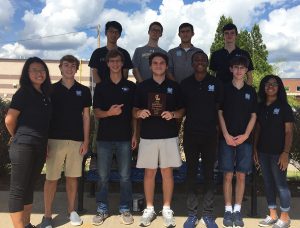 Varsity math team wields its third place plaque from recent competition at Luella High School. The team competes again on Oct. 27 at Rockdale High School.