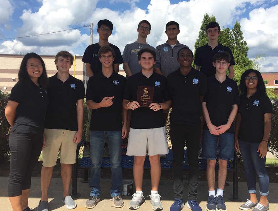 Varsity math team wields its third place plaque from recent competition at Luella High School. The team competes again on Oct. 27 at Rockdale High School.