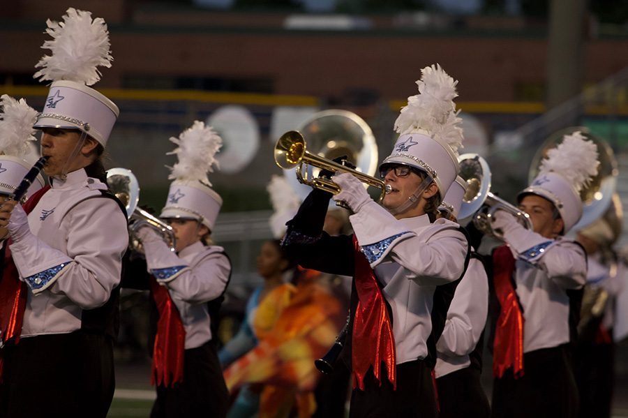 Junior Liam Ravita plays the trumpet as the band performs their “Fire and Ice” halftime show. With the football team having a bye this week, the band will perform a free show for the public.