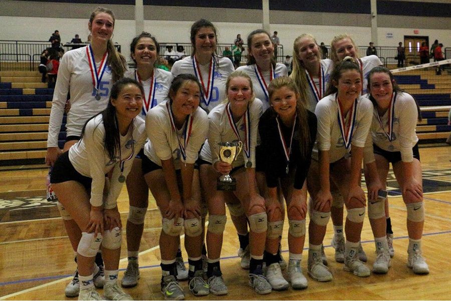 Starr’s Mill volleyball team poses with their AAAAA runner-up trophy. This was the first time the Panthers have made it to the State Championship since 2007. McIntosh defeated the Panthers 3-0, earning their fourth volleyball state title in school history.