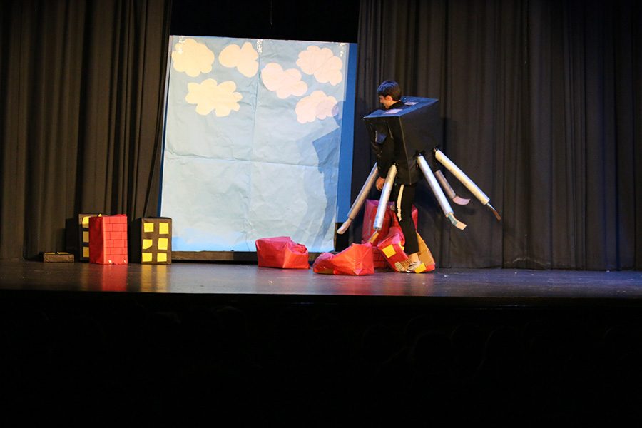 Senior Luke Presley dressed as the robot from “The Incredibles” destroys a city of cardboard boxes to fill his role in this year’s foreign language plays. It’s a tradition at Starr’s Mill for fourth-year language students to put on plays for their fellow classmates and this year brought about four successful and hilarious performances. 