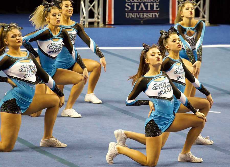 Senior Taylor Valenta leads the Starr’s Mill competition varsity cheer team as they perform at the GHSA state finals. After winning the Region 3-AAAAA championship, Starr’s Mill finished third in the AAAAA GHSA State Championships despite an error early in the performance.