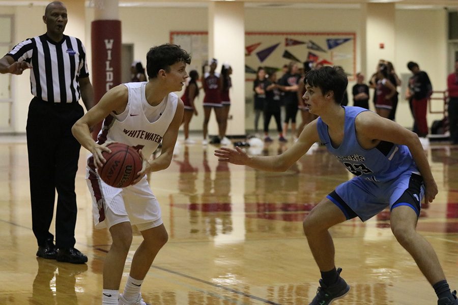 Junior Reese Clevenger defends a Whitewater player. The Panthers were active on defense, getting 11 steals on their way to a 57-46 win against the Wildcats.